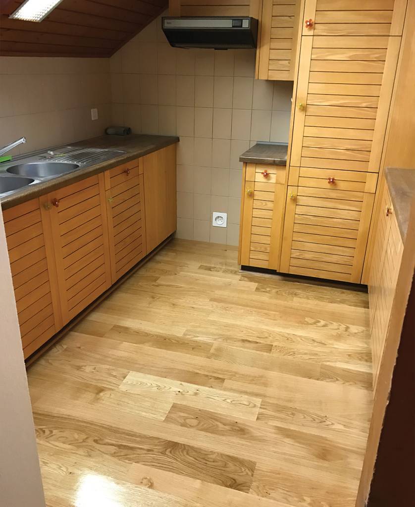 A practical, renovated wooden kitchen.